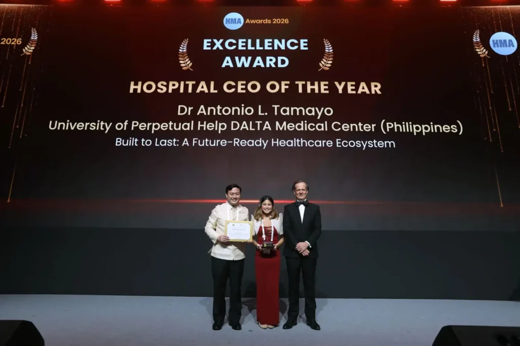 Receiving the award on behalf of Dr BGen Antonio L. Tamayo are (from left) LTC Richard Antonio M. Tamayo, President of University of Perpetual Help DALTA Medical Center (UPHDMC); Dr. Rachel Antonette G. Tamayo, Board Member; and Mr. Richard Ireland, CEO, Clarion Events Asia.